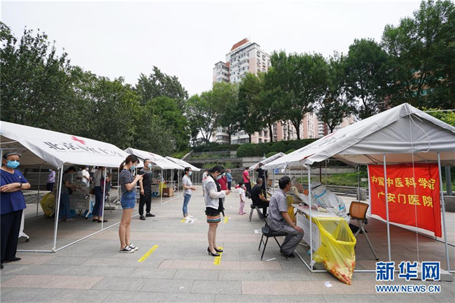 （新華全媒頭條·圖文互動(dòng)）（5）首都再戰(zhàn)“疫”，難忘40天——寫在北京應(yīng)急響應(yīng)級(jí)別降級(jí)之際 