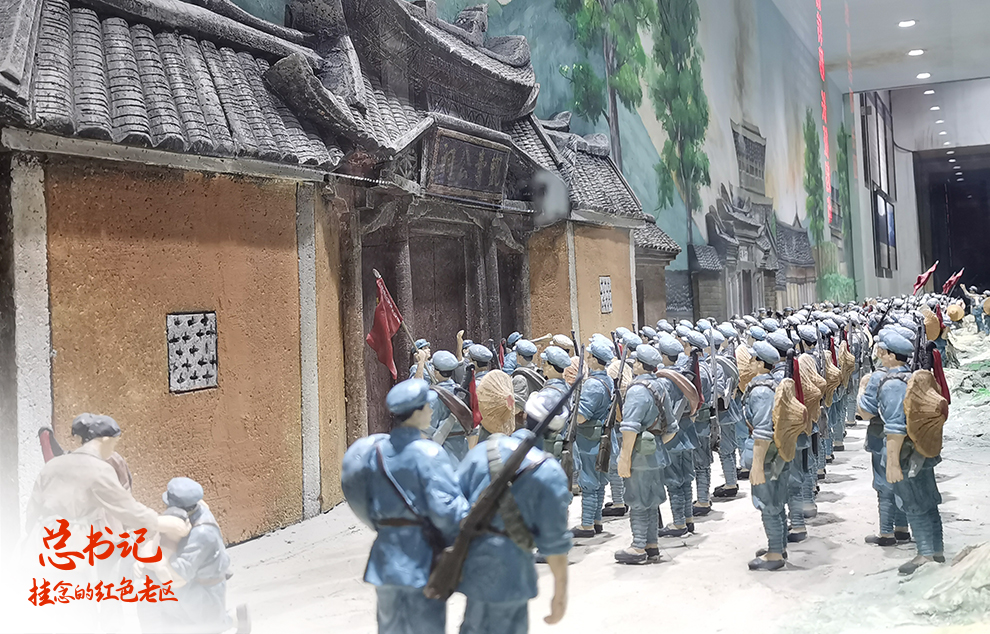 這是在福建省長(zhǎng)汀縣中復(fù)村拍攝的紅軍長(zhǎng)征出發(fā)動(dòng)員會(huì)微型雕塑（2021年4月27日攝）。